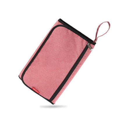 tapis à langer nomade - Mamanplusbebe