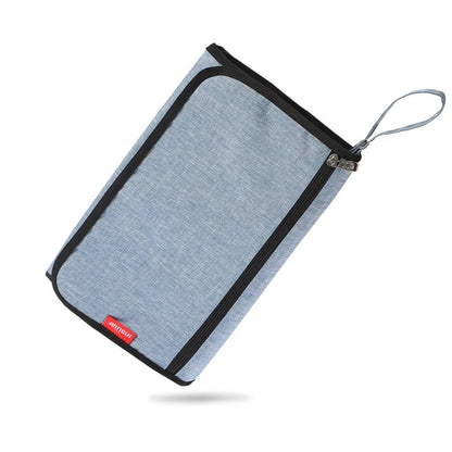 tapis à langer nomade - Mamanplusbebe